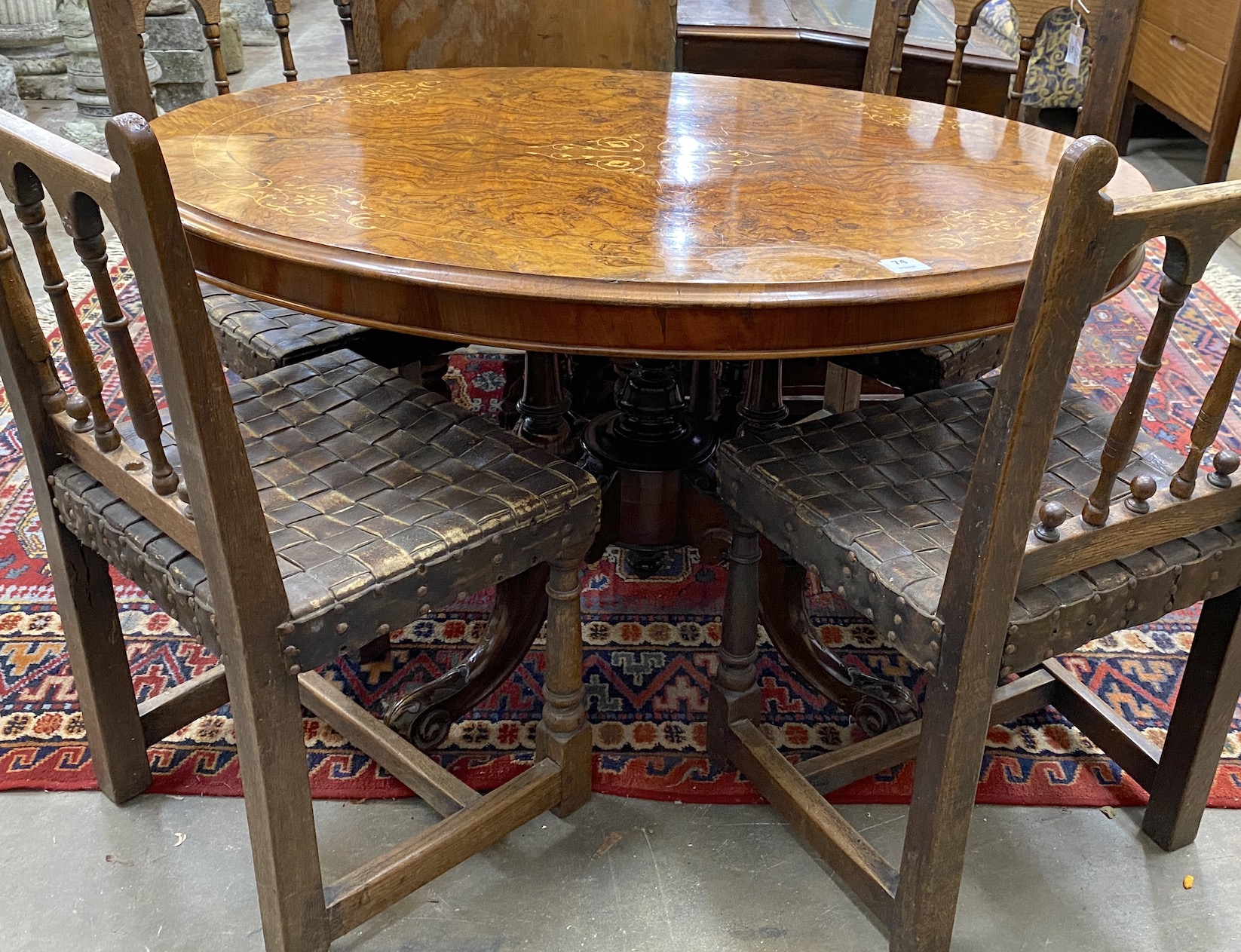A Victorian inlaid figured walnut oval tilt top loo table, width 120cm, depth 86cm, height 72cm